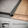 Порожок микро ALU-P001 Kluchuk — черный анодированный профиль для стыковки покрытий